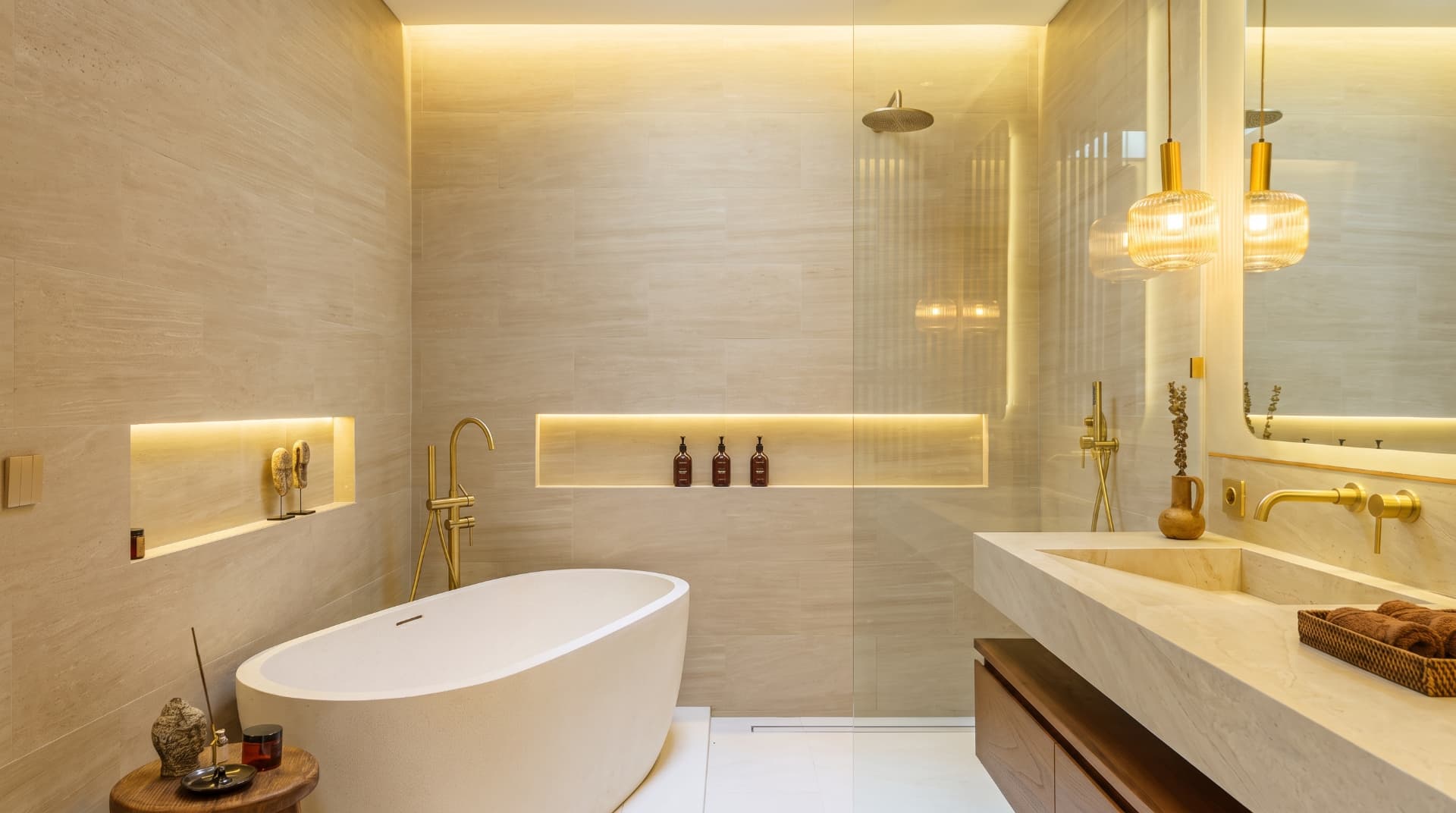 Original listing photograph of the travertine bathroom with freestanding tub